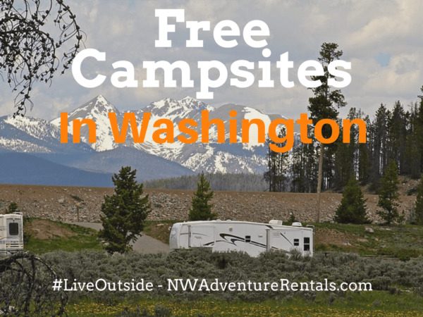 RV parked in a scenic Washington forest with mountains in the background, titled “Free Campsites in Washington”